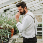 Michael Perry, aka Mr Plant Geek, smelling herbs