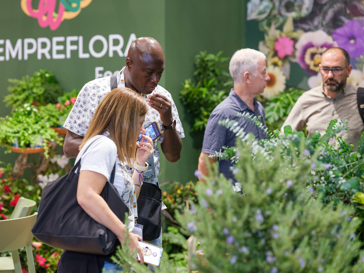 Visitors exploring plant displays at Iberflora 2024 in Feria Valencia.