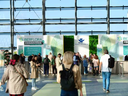 Visitors arrive at the entrance of Iberflora 2025 at Feria Valencia, Spain, on the opening day of the international green industry trade fair.