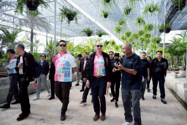 AIPH Site Inspection Team walks through a greenhouse during the inspection visit to Udon Thani Expo site.