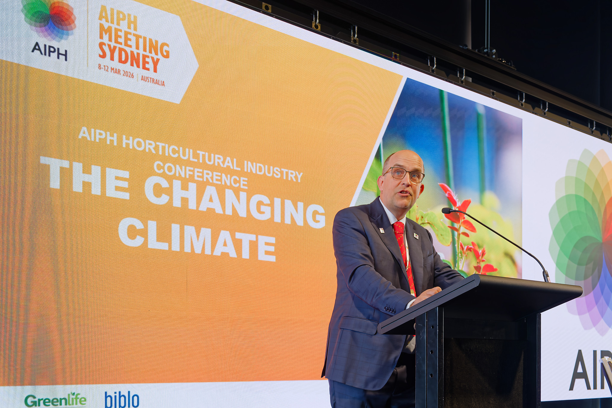 Speaker addresses delegates on climate change at the AIPH International Horticultural Industry Conference in Sydney.