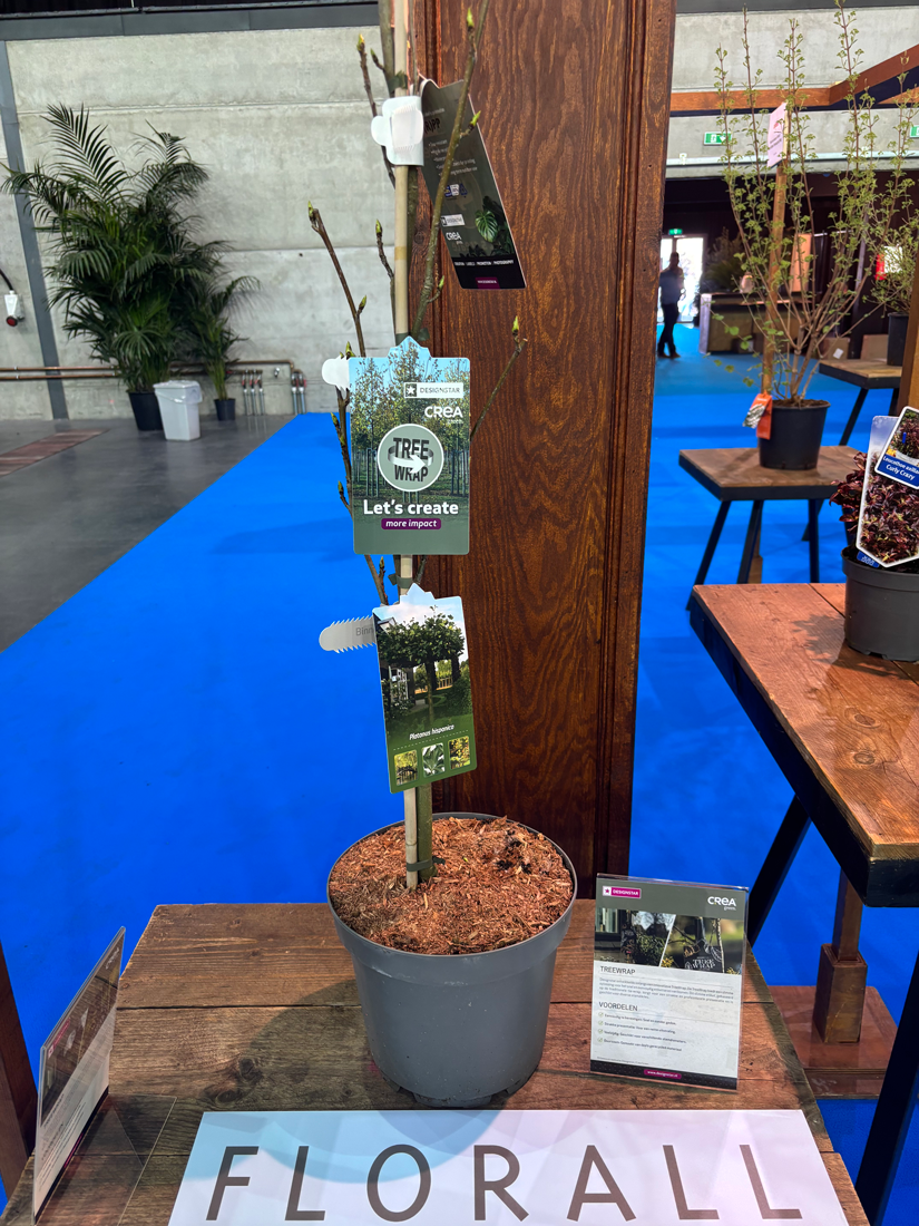 Young tree displayed with Treewrap trunk protection system at the Florall innovation showcase.
