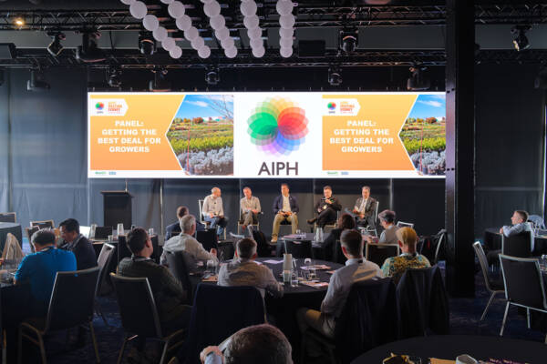 Panel speakers in discussion during AIPH Conference session on grower and retail relationships