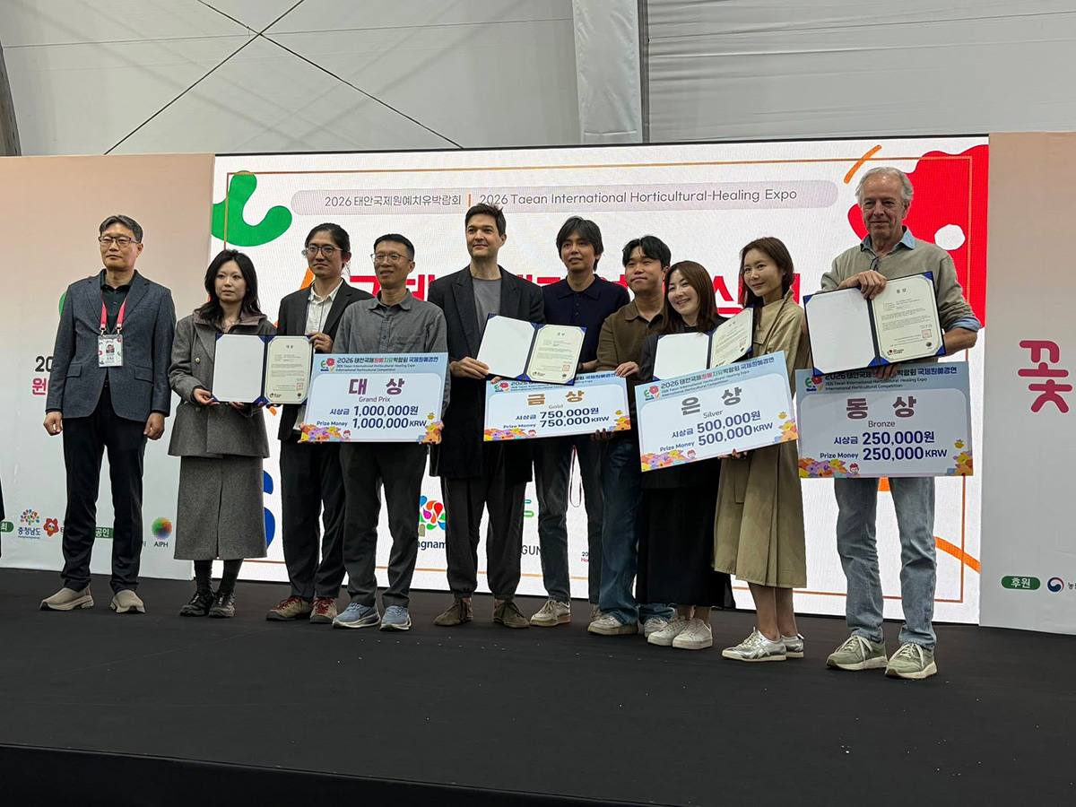Award winners holding certificates on stage at the Taean International Horticultural-Healing Expo 2026
