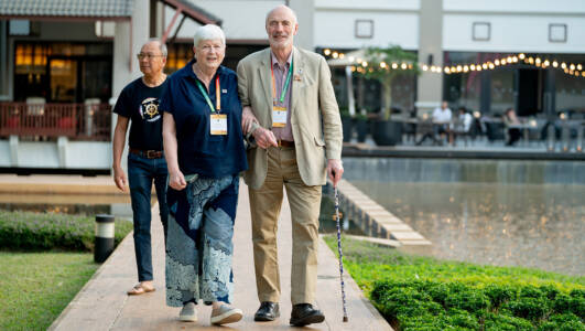 Paul and Kay Rochford walking together during the AIPH Spring Meeting 2025 in Thailand.