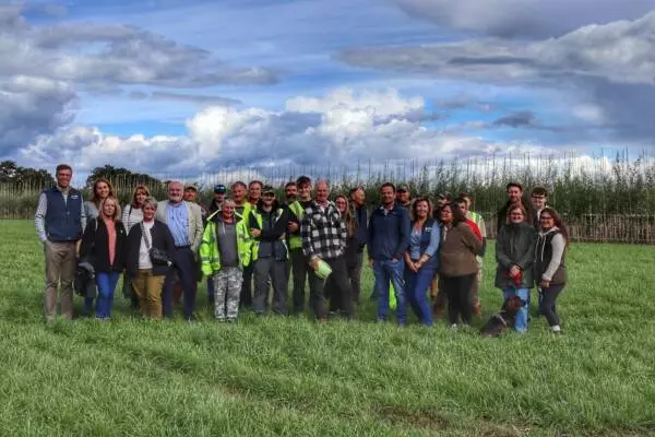 Hillier Nurseries team members standing in production fields at the UK nursery site.