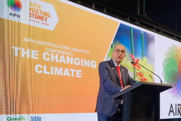 Speaker addresses delegates on climate change at the AIPH International Horticultural Industry Conference in Sydney.