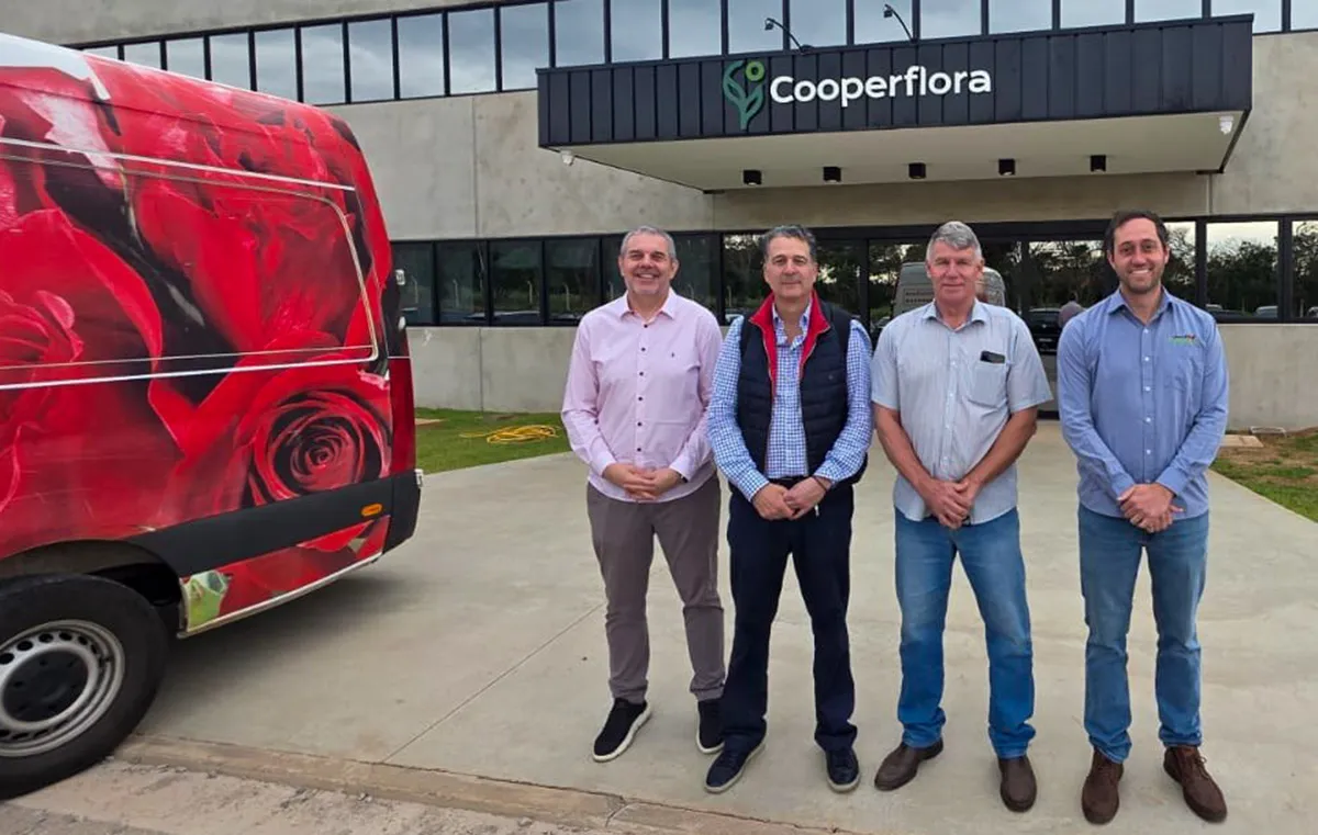 José Antonio Restrepo Rada with colleagues outside Cooperflora flower export facility in Colombia.