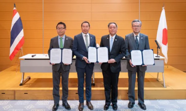 Officials from Japan and Thailand display signed participation agreements for GREEN×EXPO 2027 at the Royal Thai Embassy in Tokyo.