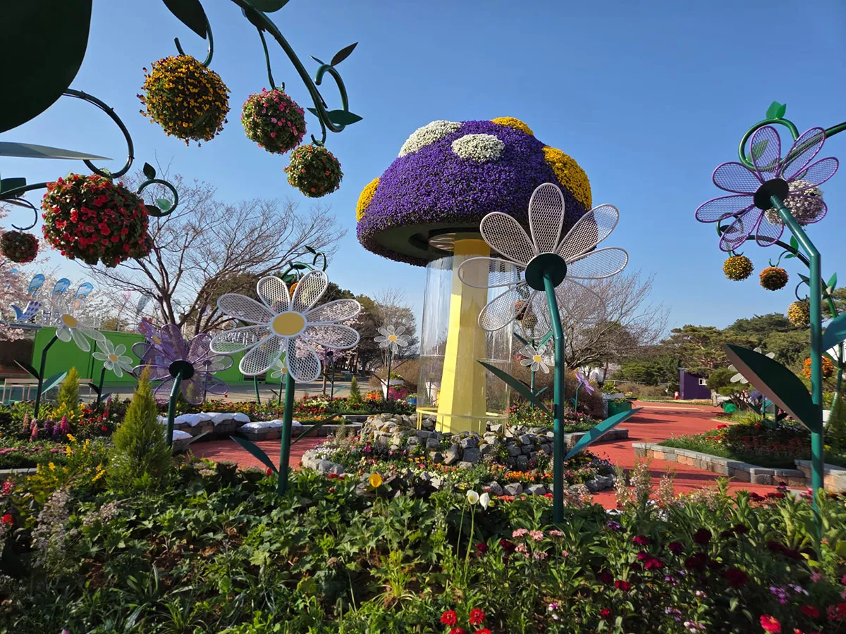 Decorative flower structures and themed garden installation at Taean Expo