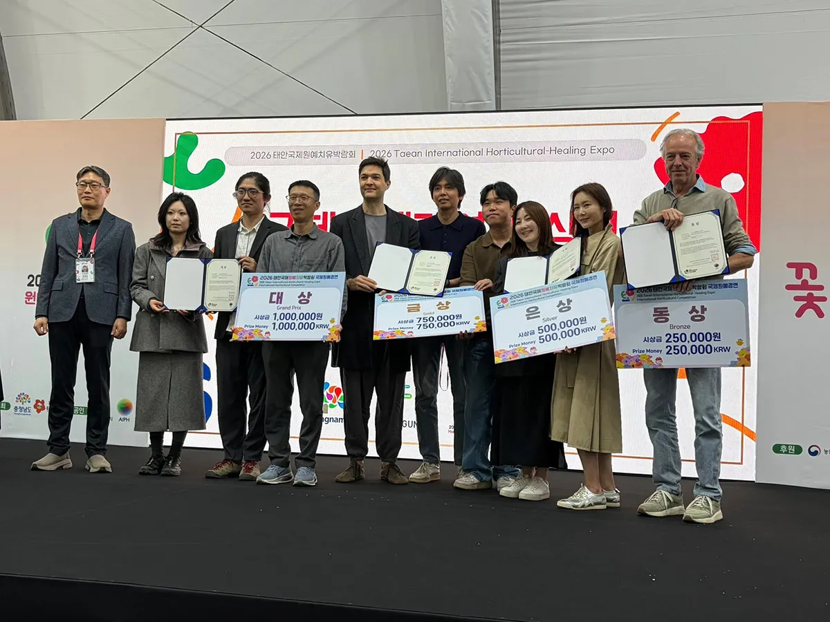 Award winners holding certificates on stage at the Taean International Horticultural-Healing Expo 2026